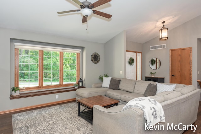 530 Pine Haven Dr, Comstock Park, MI 49321 - living area featuring vaulted ceiling, ceiling fan, and wood finished floors