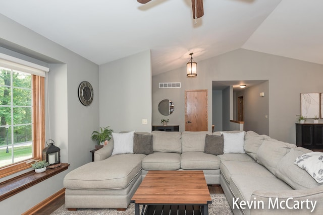 530 Pine Haven Dr, Comstock Park, MI 49321 - living room featuring vaulted ceiling, ceiling fan, and wood finished floors