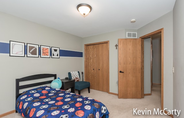 530 Pine Haven Dr, Comstock Park, MI 49321 - carpeted bedroom with a closet and baseboards