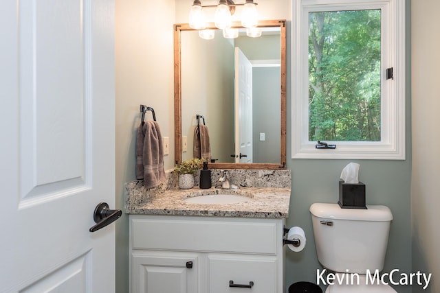 530 Pine Haven Dr, Comstock Park, MI 49321 - bathroom with vanity and toilet