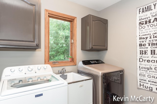 530 Pine Haven Dr, Comstock Park, MI 49321 - laundry room featuring washing machine and dryer and cabinet space