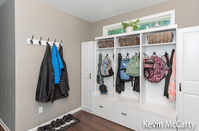 530 Pine Haven Dr, Comstock Park, MI 49321 - mudroom with dark wood-style floors and baseboards