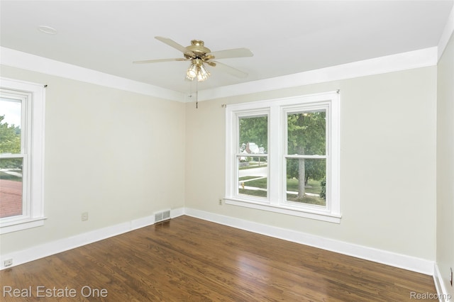 14711 Borgman St, Oak Park, MI 48237 - unfurnished room featuring dark wood-style flooring and ceiling fan