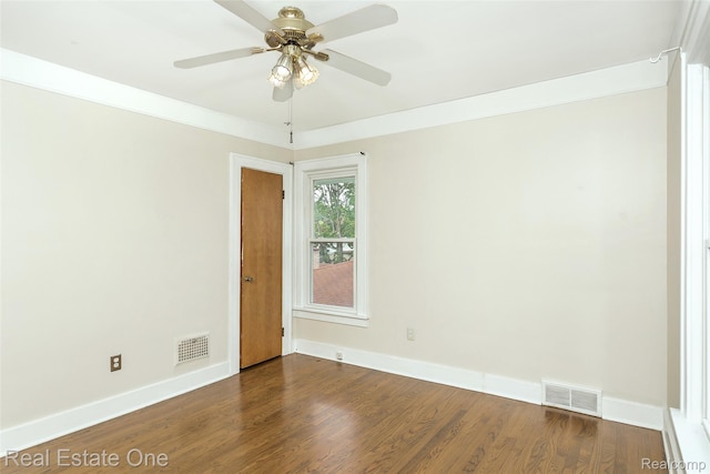 14711 Borgman St, Oak Park, MI 48237 - spare room featuring ceiling fan and dark wood-style flooring
