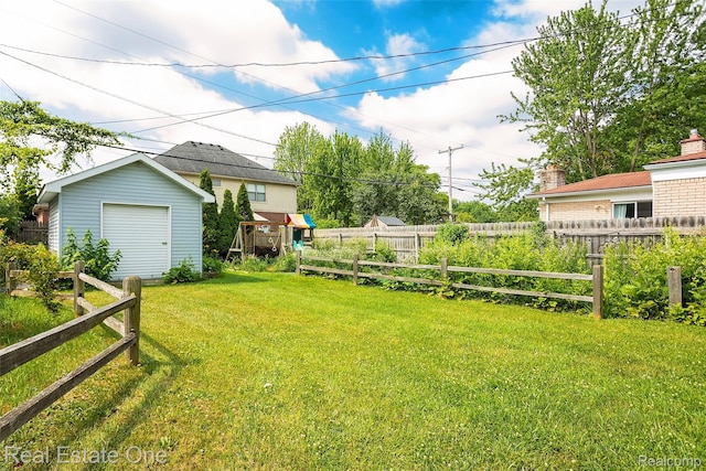 14711 Borgman St, Oak Park, MI 48237 - view of yard with an outbuilding and a garage