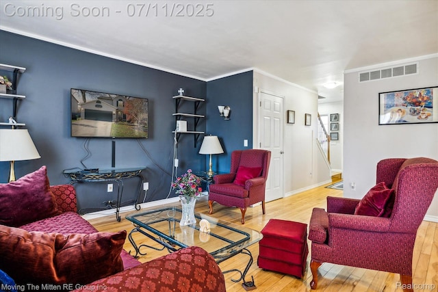21203 Collingham Ave, Farmington Hills, MI 48336 - living area with wood finished floors, stairs, and crown molding