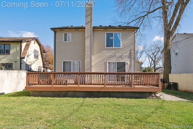 21203 Collingham Ave, Farmington Hills, MI 48336 - back of house featuring a wooden deck and a chimney