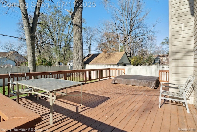 21203 Collingham Ave, Farmington Hills, MI 48336 - wooden deck featuring a fenced backyard, a covered hot tub, and outdoor dining area