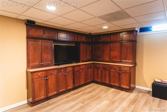 6020 Majestic Oaks Dr, Commerce Twp, MI 48382 - bar area featuring light wood-style flooring and a drop ceiling
