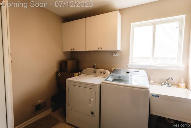 6020 Majestic Oaks Dr, Commerce Twp, MI 48382 - washroom with cabinet space and washer and dryer