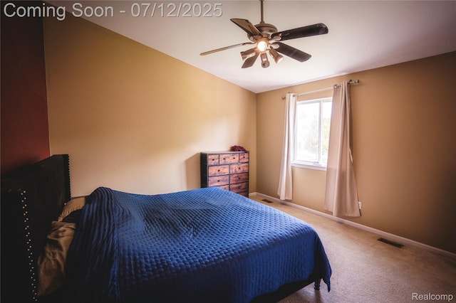 6020 Majestic Oaks Dr, Commerce Twp, MI 48382 - carpeted bedroom with baseboards and a ceiling fan