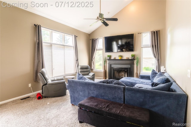 6020 Majestic Oaks Dr, Commerce Twp, MI 48382 - carpeted living area featuring a fireplace, ceiling fan, plenty of natural light, and high vaulted ceiling