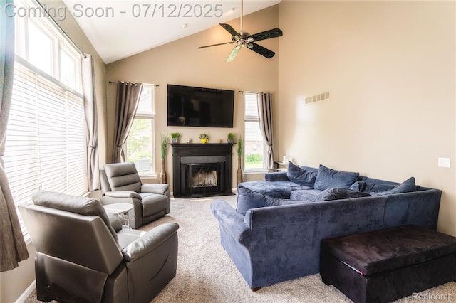 6020 Majestic Oaks Dr, Commerce Twp, MI 48382 - carpeted living area with a ceiling fan, a fireplace with flush hearth, and high vaulted ceiling