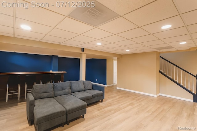 6020 Majestic Oaks Dr, Commerce Twp, MI 48382 - living room with wood finished floors, stairway, recessed lighting, and a drop ceiling