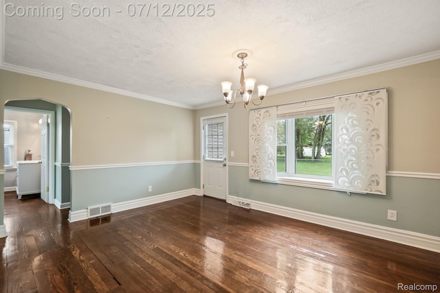 3811 Benstein Rd, Commerce Twp, MI 48382 - spare room with hardwood / wood-style floors, a chandelier, crown molding, arched walkways, and a textured ceiling