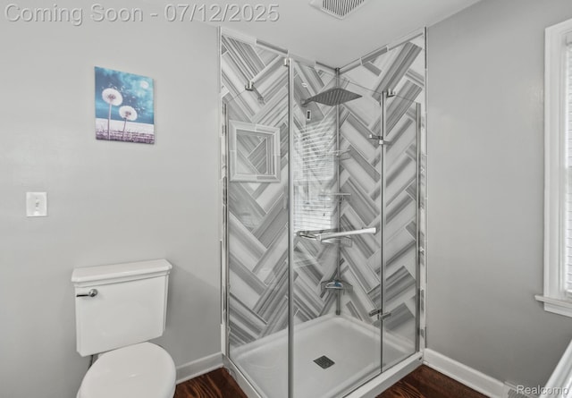 3811 Benstein Rd, Commerce Twp, MI 48382 - bathroom with a stall shower and wood finished floors