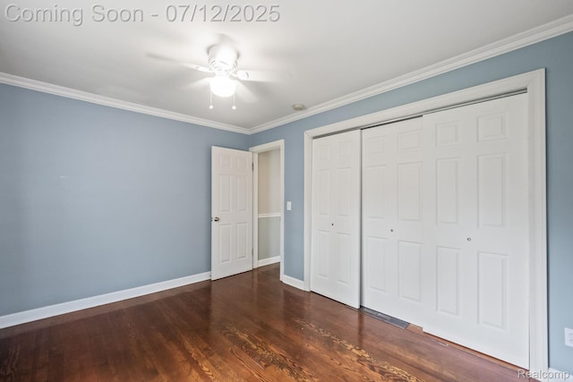 3811 Benstein Rd, Commerce Twp, MI 48382 - unfurnished bedroom with a closet, dark wood-type flooring, ornamental molding, and ceiling fan