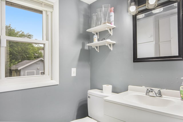 728 Fifth St, Jackson, MI 49203 - bathroom with toilet and vanity