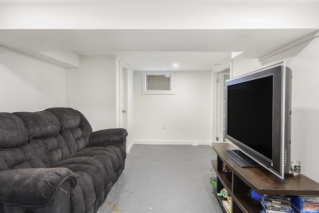 728 Fifth St, Jackson, MI 49203 - living room featuring concrete floors and baseboards