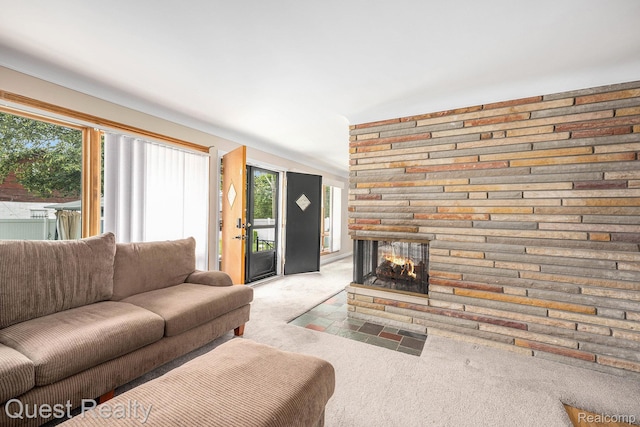 31618 Winchester Ave, Warren, MI 48092 - living room with carpet flooring, healthy amount of natural light, and a multi sided fireplace