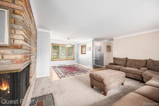 31618 Winchester Ave, Warren, MI 48092 - carpeted living room featuring a fireplace and baseboards