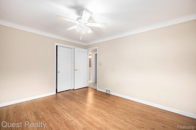 31618 Winchester Ave, Warren, MI 48092 - unfurnished bedroom with light wood-type flooring, a closet, and a ceiling fan