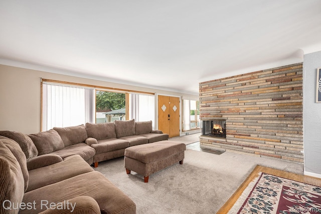 31618 Winchester Ave, Warren, MI 48092 - living area featuring a stone fireplace and light wood-style floors