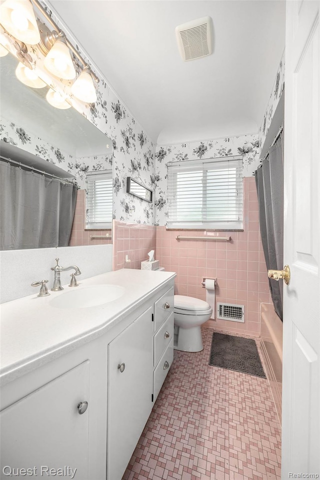 31618 Winchester Ave, Warren, MI 48092 - full bathroom featuring wallpapered walls, vanity, tile walls, wainscoting, and tile patterned floors