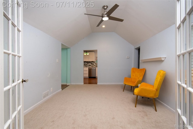 3110 Brisbane St, Walled Lake, MI 48390 - living area featuring french doors, carpet flooring, plenty of natural light, ceiling fan, and vaulted ceiling