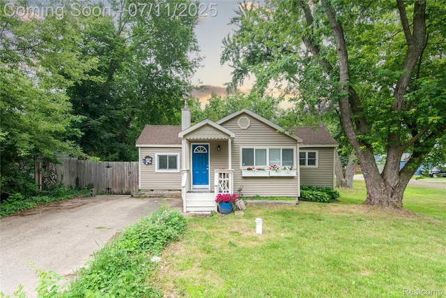 3110 Brisbane St, Walled Lake, MI 48390 - view of front of property featuring a chimney and roof with shingles
