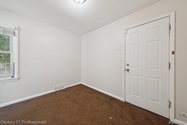 18140 Westover Ave, Southfield, MI 48075 - empty room with dark carpet and baseboards