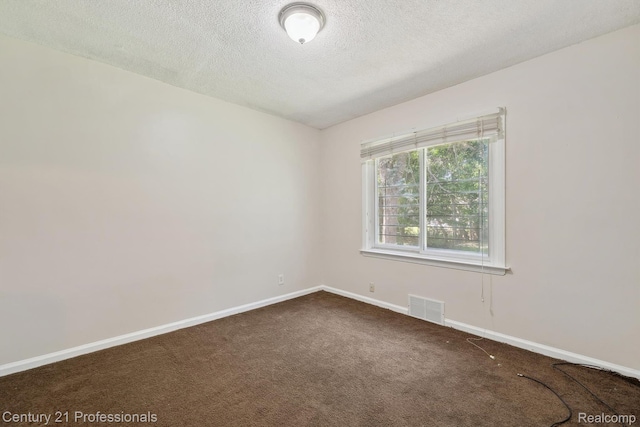 18140 Westover Ave, Southfield, MI 48075 - empty room with dark carpet and a textured ceiling