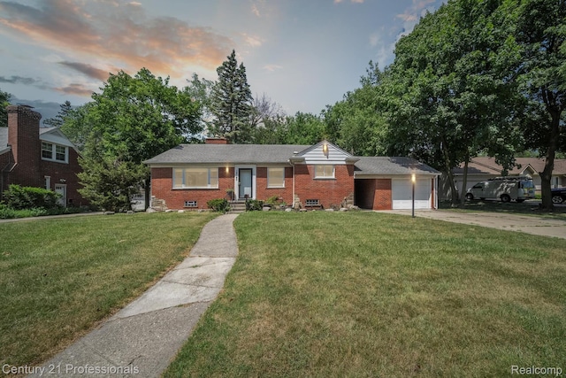 18140 Westover Ave, Southfield, MI 48075 - view of front of house featuring brick siding, concrete driveway, a garage, a lawn, and a chimney
