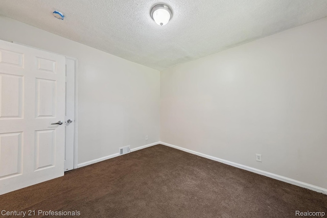 18140 Westover Ave, Southfield, MI 48075 - spare room with dark colored carpet and a textured ceiling