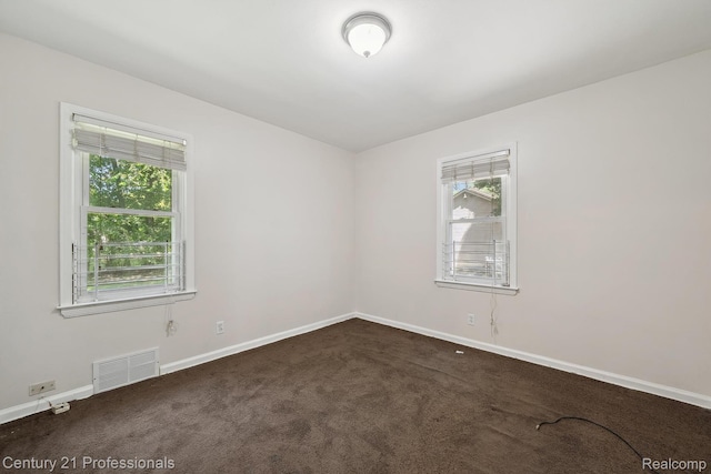 18140 Westover Ave, Southfield, MI 48075 - unfurnished room featuring healthy amount of natural light and dark colored carpet