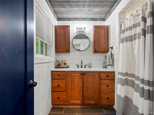 3365 Howland Rd, Almont, MI 48003 - full bath featuring vanity, wood finished floors, and curtained shower