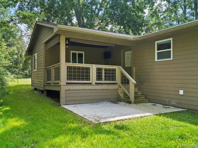 3365 Howland Rd, Almont, MI 48003 - back of house with a lawn and a patio