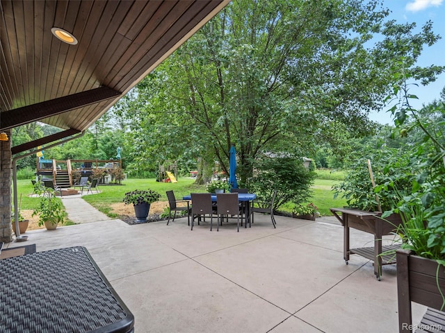3365 Howland Rd, Almont, MI 48003 - view of patio / terrace featuring a playground and outdoor dining space
