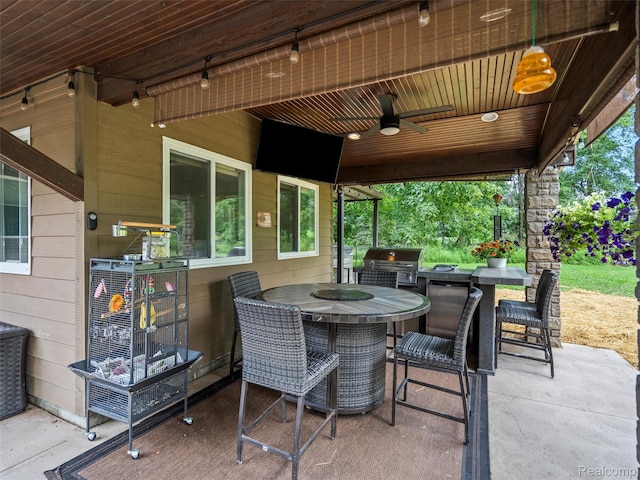 3365 Howland Rd, Almont, MI 48003 - view of patio / terrace with area for grilling, a ceiling fan, and outdoor dining space
