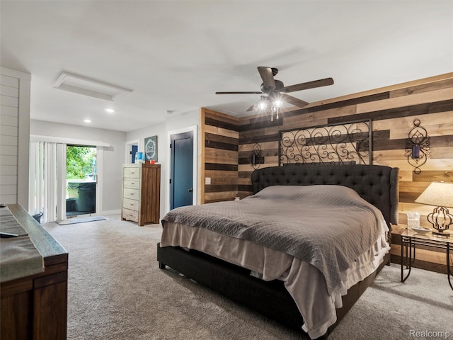 3365 Howland Rd, Almont, MI 48003 - bedroom featuring attic access, access to outside, light colored carpet, wood walls, and recessed lighting