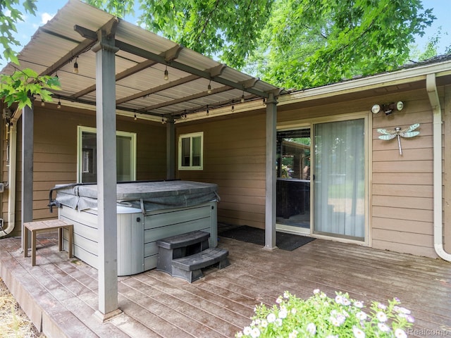 3365 Howland Rd, Almont, MI 48003 - wooden terrace featuring a hot tub