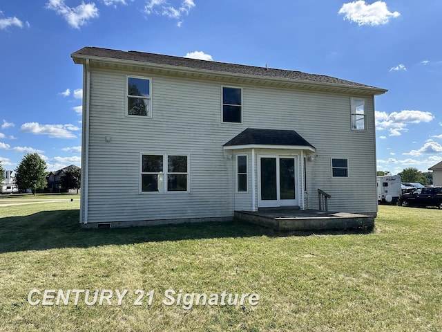 7265 Deweigan Ln, Mount Pleasant, MI 48858 - back of property featuring a lawn