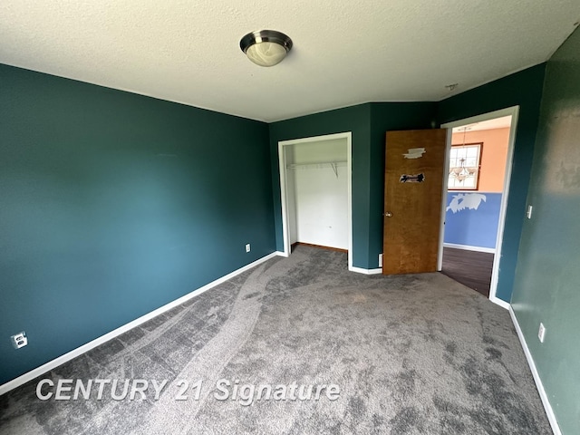 7265 Deweigan Ln, Mount Pleasant, MI 48858 - unfurnished bedroom with carpet floors, a closet, and a textured ceiling