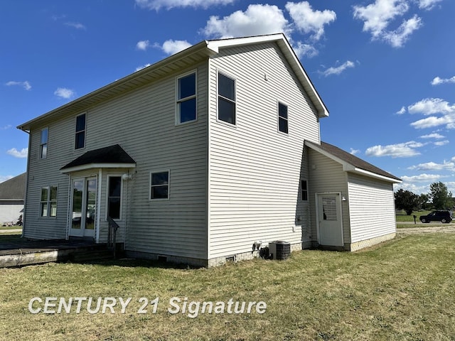 7265 Deweigan Ln, Mount Pleasant, MI 48858 - back of house featuring crawl space and a lawn