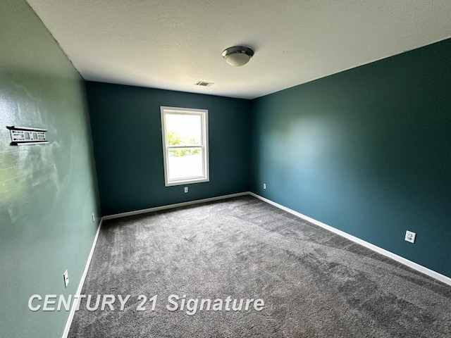 7265 Deweigan Ln, Mount Pleasant, MI 48858 - carpeted spare room featuring baseboards
