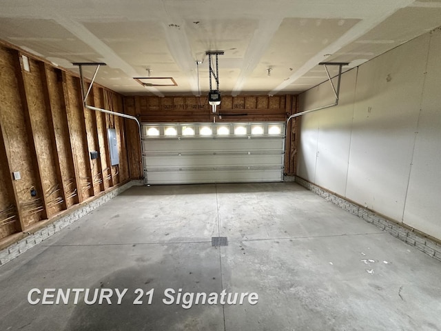7265 Deweigan Ln, Mount Pleasant, MI 48858 - garage featuring a garage door opener