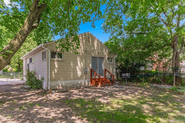 1085 Pennsylvania Ave, Lincoln Park, MI 48146 - rear view of house with entry steps