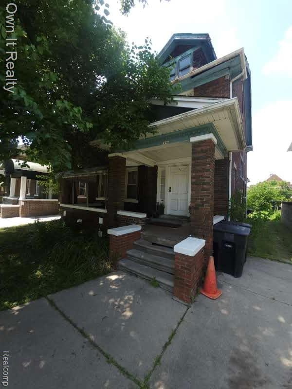 1950 Lawrence St, Detroit, MI 48206 - view of front of property with covered porch
