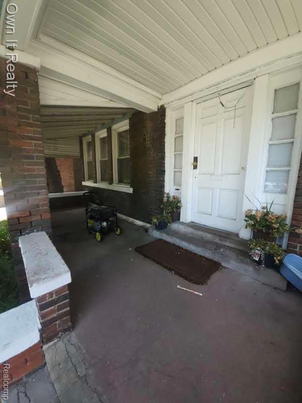 1950 Lawrence St, Detroit, MI 48206 - entrance to property with brick siding
