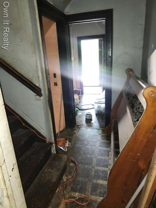 1950 Lawrence St, Detroit, MI 48206 - hallway featuring stairway